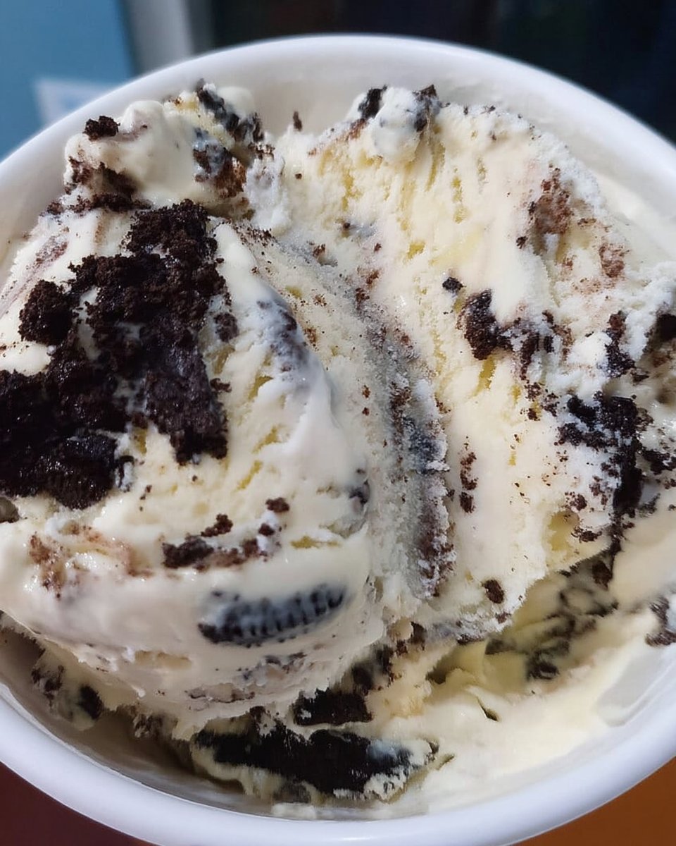 Ingredients for cookies including cream cheese butter and chopped Oreos