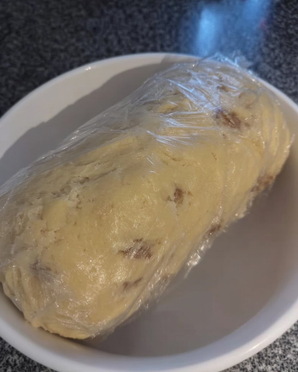 Ingredients for pecan snowballs including pecans, butter, flour, and Mexican vanilla