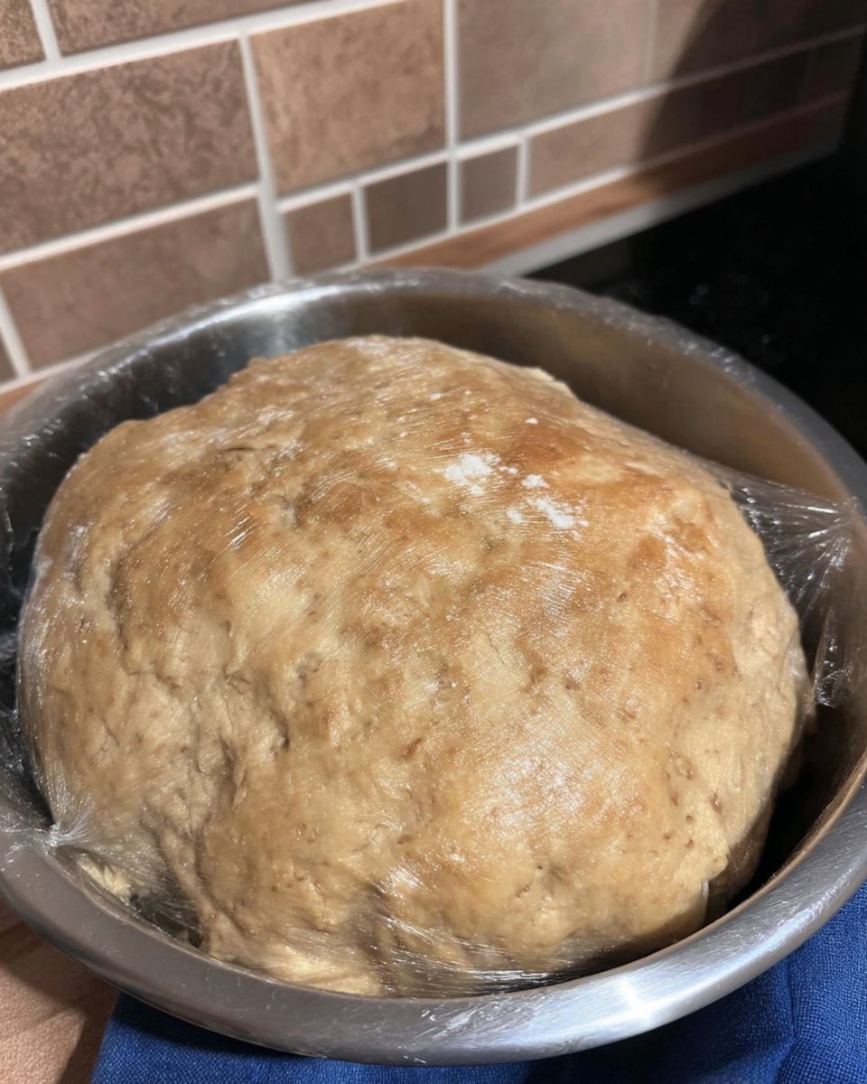 Rolling dough for apple cookies on floured surface