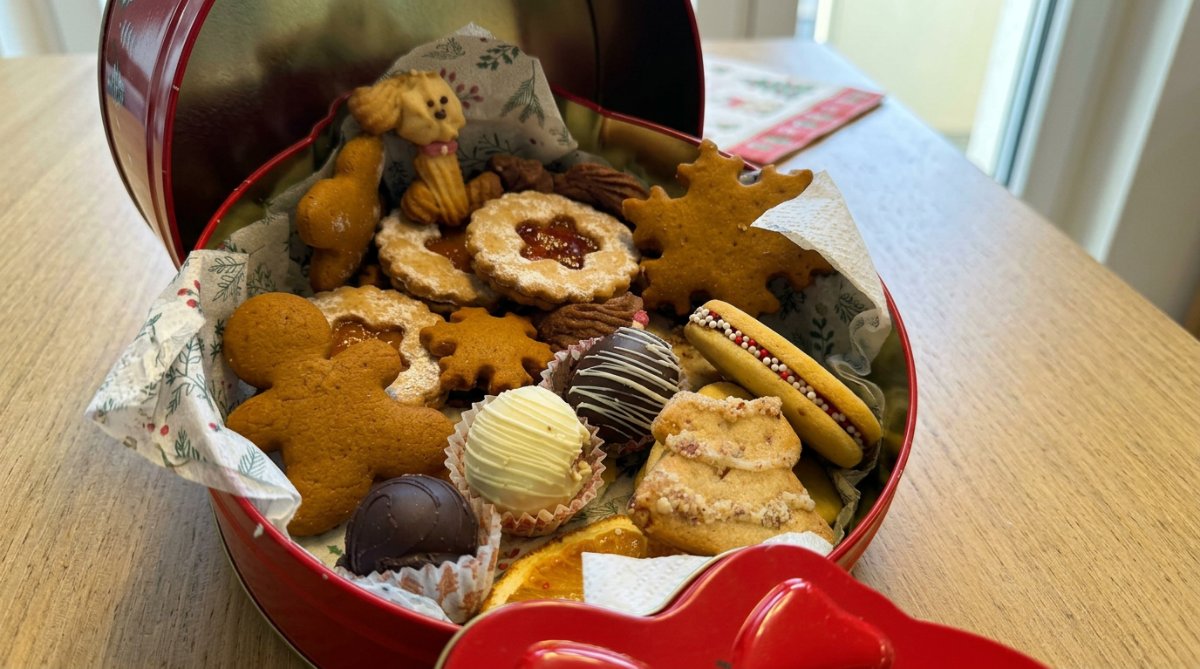Ingredients for Christmas sugar cookies including flour butter and almond extract