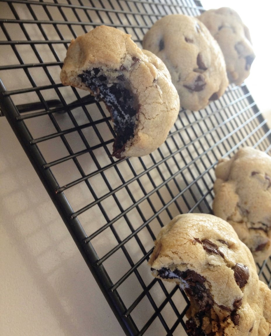 Freshly baked Oreo stuffed chocolate chip cookies with golden edges