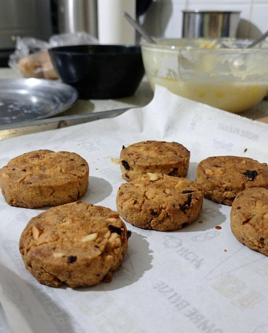 Naan Khatai cookies served next to a cup of hot Indian chai.
